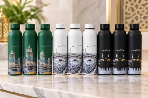 Souvenir water bottles with Makkah designs – gifts for pilgrims